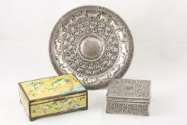 A white metal trinket box possibly Indian, late 19th century, embossed with scrolls, flowers and