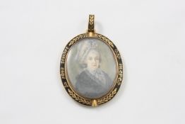 A miniature of a lady French, late 19th century, set within an oval shaped mourning pendant