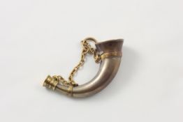 A vinaigrette and scent bottle in the form of a horn circa 1871, stamped on the inside S. Mordon &