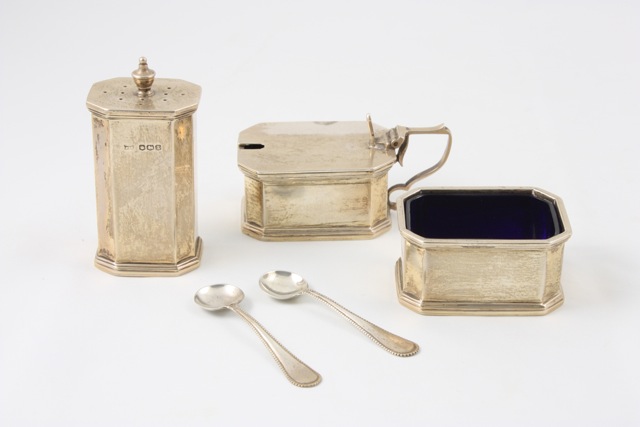 A silver condiment set hallmarked Sheffield, 1940/41, with makers mark for Walker & Hall, of Art