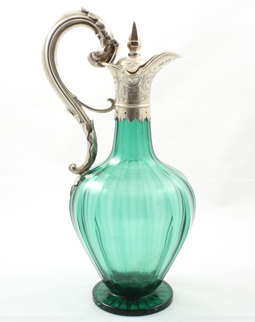 An early Victorian glass and silver claret jug hallmarked London 1839/40, with makers mark for