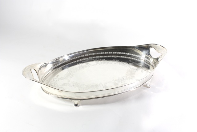 A large silver oval tray hallmarked London, 1896/97, with makers mark for Hawksworth, Eyre & Co Ltd,