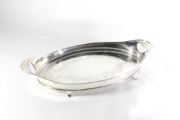 A large silver oval tray hallmarked London, 1896/97, with makers mark for Hawksworth, Eyre & Co Ltd,