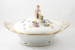 A Meissen tureen and cover German, 20th century, of oval form with handles either side, hand painted