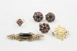 A Victorian garnet and silver dress ring and matching clip earrings together with an additional