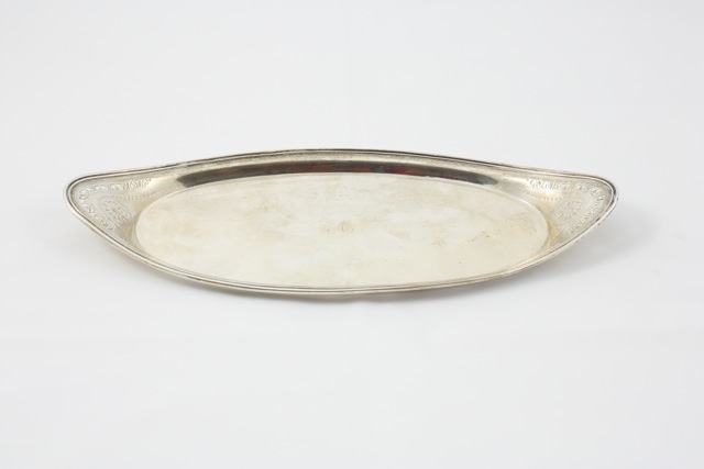 A George III silver candle snuffer tray hallmarked London, 1810/11, of oval form with pierced ends