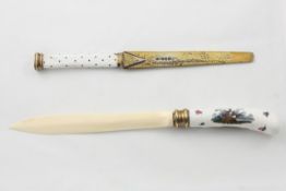 An 18th century porcelain knife handle probably German, painted with birds, chickens and ducks,