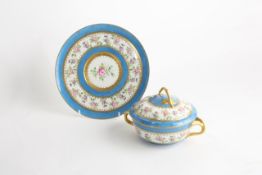 An early 20th century porcelain two handled bowl cover and stand French, in Sevres style, with