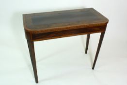 A late George III mahogany and satinwood banded fold over card table with rounded front raised on