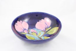 A Moorcroft `Magnolia` circular bowl English, circa 1976, the interior with tube lined decoration