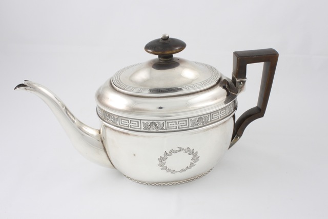 A George III silver teapot hallmarked London 1804/05, with makers initials AK for Abstinando King,