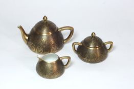 An unusual Japanese export ware three piece tea set circa 1900, in original box, each piece