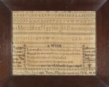 A sampler dated 1818, the alphabet embroidered in upper and lower case, with a poem about patience