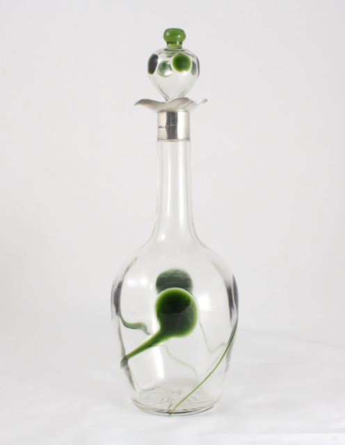 An Art Nouveau silver collared glass decanter and stopper hallmarked Birmingham, 1905/06, the