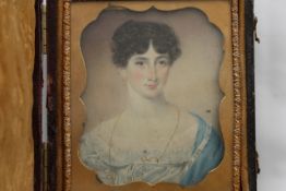 A square portrait miniature on ivory of a lady early 19th century, in fitted leather case, length