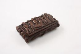 An 18th century carved wooden snuff box American, the lid carved with a funeral scene featuring an