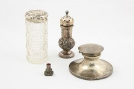 A small collection of silver comprising an inkwell hallmarked Birmingham 1908, a glass dressing