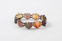 A Cairngorm silver coloured metal bracelet Scottish, circa 1880, set with various coloured agates,