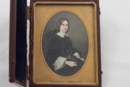 An oval portrait on ivory of Rachael Wadham late 19th century, fitted in a leather case, length