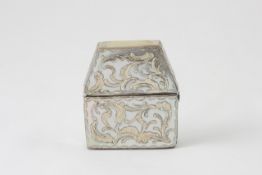 A mother of pearl covered etui late 19th century, of shaped form with applied metal floral