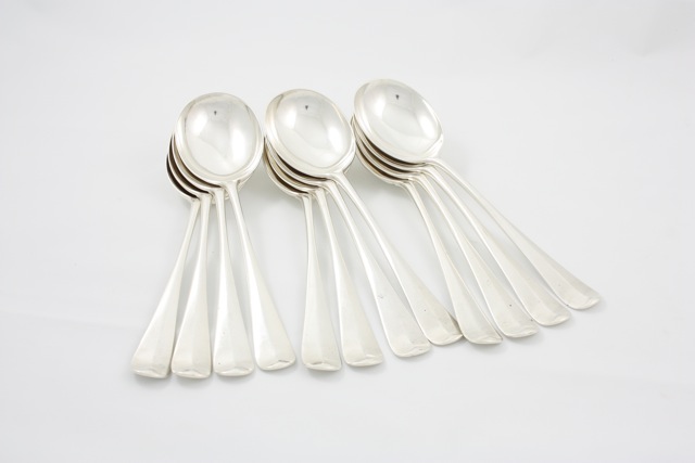 Twelve silver Mappin and Webb soup spoons hallmarked Sheffield, 1936, length 19.5cm In good