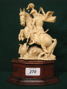 HEAVILY CARVED IVORY FIGURE GROUP DEPICTING ST GEORGE AND THE DRAGON ON WOODEN BASE, NO MAKER`S