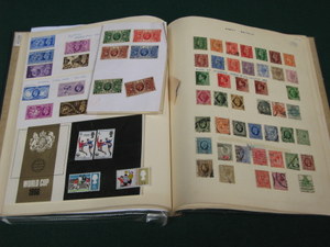 ALBUM CONTAINING BRITISH AND FOREIGN POSTAGE STAMPS