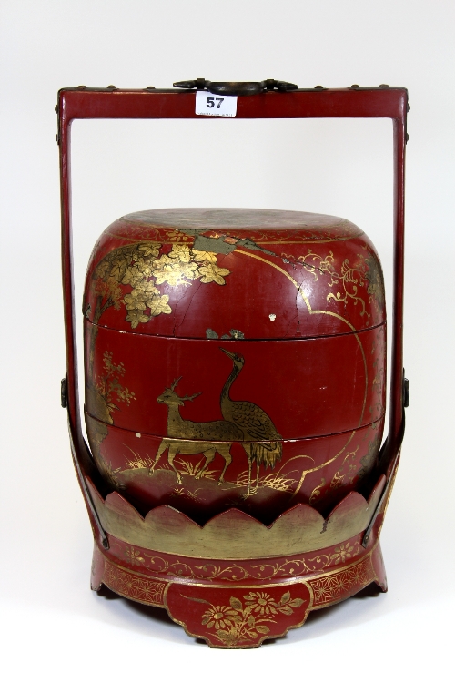 A 19thC Chinese lacquered wood and papier mache food carrying basket. Lid a.f