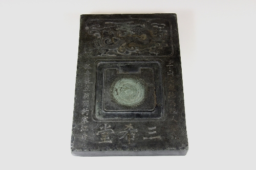 An early 20thC Chinese carved stone ink grinding block 30x20x3cm