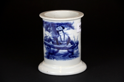 A Chinese hand painted porcelain brush pot H12.5cm four character mark to base.