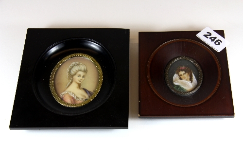 Two framed hand painted miniatures of ladies