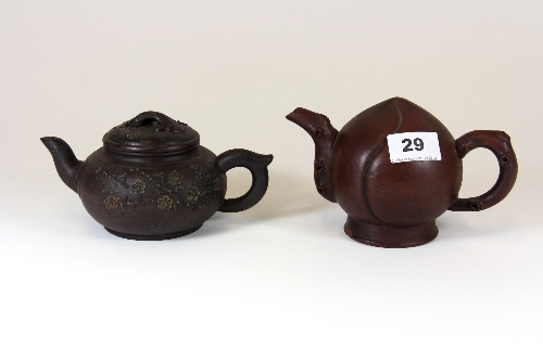 Two Chinese Yi Xing terracotta tea pots, one slightly a.f