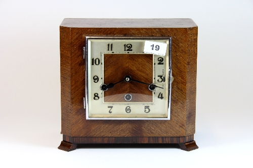 An Art Deco oak veneered mantle clock by Haller (recently serviced)