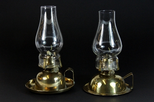 A pair of 19thC brass chamber stick oil lamps.