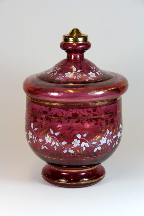 A 19thC Bohemian painted and gilt bowl and cover.H.33cm