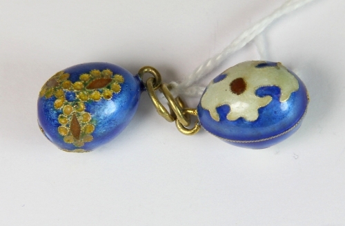 Two further silver gilt and enamelled Faberge style eggs