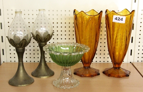 A Victorian glass sugar bowl, a pair of amber glass vases and a pair of oil lamps.