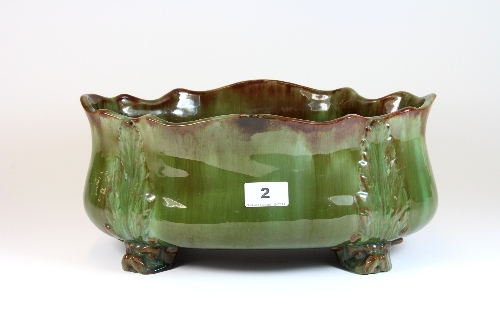 A French early 20th century glazed pottery planter H16cm W34cm