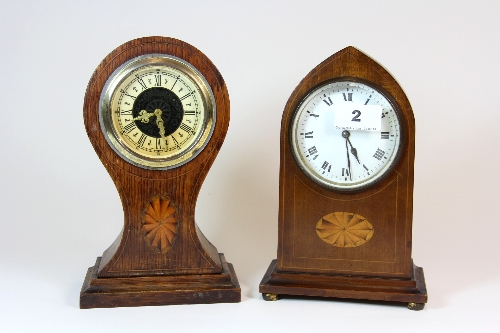 Two inlaid mantle clocks.