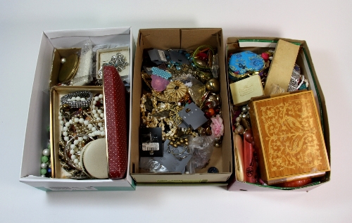 A large box of costume jewellery.