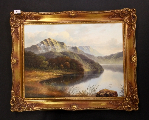 A G Kurtis gilt framed oil on canvas of a mountain lake scene. 75 x 59cm