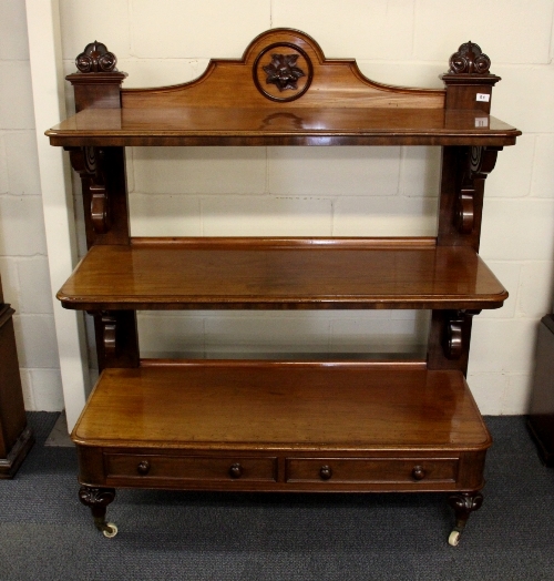 A superb early 19thC mahogany three tier buffet with two drawers. W.120cm H.144cm