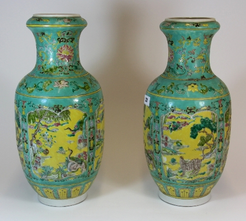 A fine pair of 19th/20thC Chinese hand painted porcelain vases with imperial yellow and green