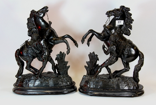 A pair of large Victorian spelter Marley horses on wooden bases H.43cm