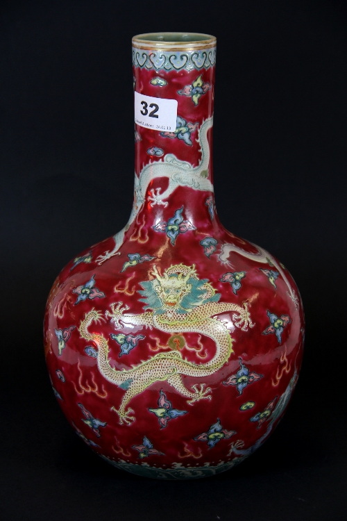 A fine 19thC Chinese hand enamelled porcelain vase with decoration of dragons. Private estate.