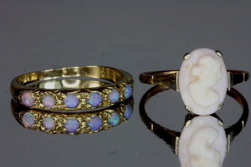 Two 9ct gold rings, one set with 7 opals, the other a small cameo.