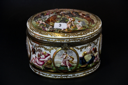 A large hand painted Naples porcelain box with ormolu mount the lid depicting an ancient battle