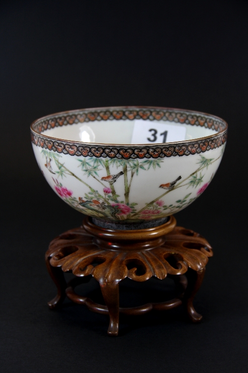 A very fine mid 20thC hand painted eggshell porcelain bowl on carved wooden stand. Overall H. 12cm