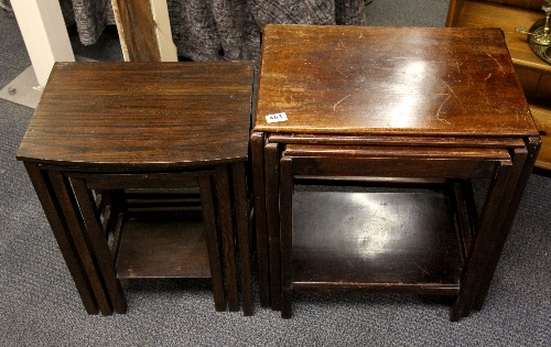 A nest of three mahogany tables, and a further nest of three oak tables.