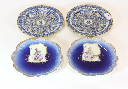 A pair of hand painted English bone china plates (D 20.5cms) and a further pair of continental